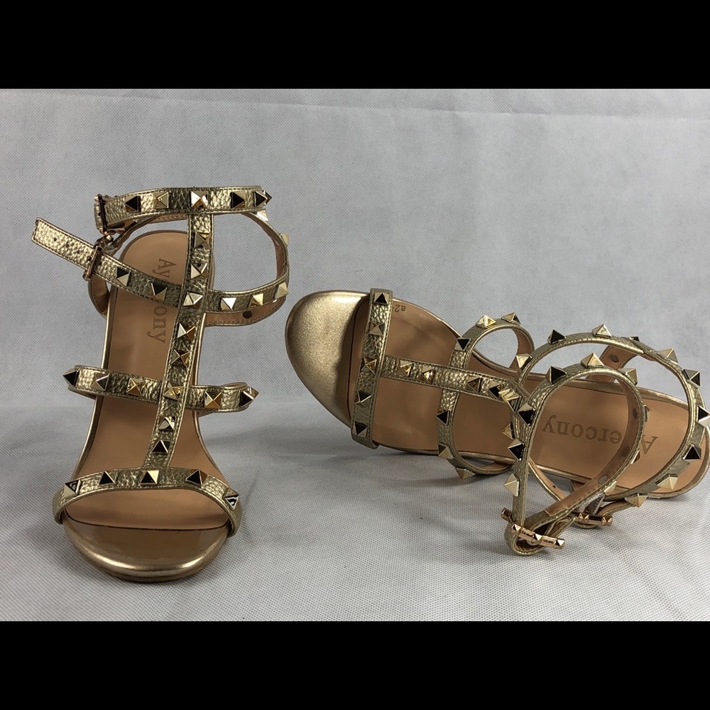 Ayercony gold studded heels.  Size 6.